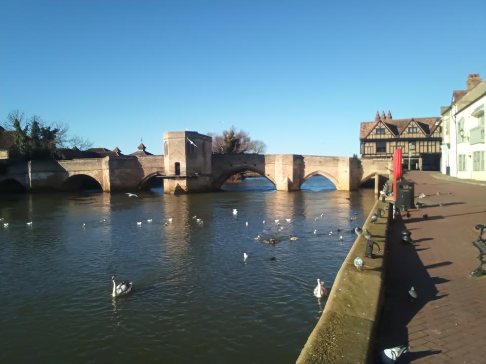 River with a stone bridge over it