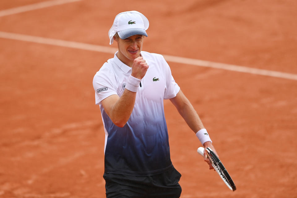 Marc Polmans fist-pumps after a point after winning a point during his Men's Singles first round match against Ugo Humbert.