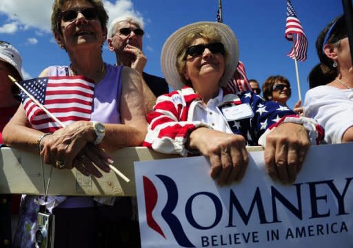 Supporters of US presidential hopeful Mitt Romney attend a campaign rally at Scamman Farm in Stratham, New Hampshire. Romney kicked off a six-state bus tour Friday across what he called the "backbone of America," as he seeks to cast himself as more in touch with struggling voters than President Barack Obama