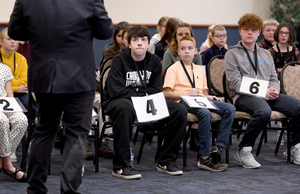 Spellers listen to instructions before the start of The Canton Repository 77th Regional Final Spelling Bee at Kent State Conference Center on Saturday.