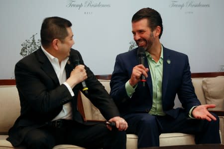 Executive Vice President of The Trump Organization, Donald J. Trump Jr., and Chairman of MNC Group, Hary Tanoesoedibjo, react during a news conference after pre-launched of the Trump Residences in Jakarta