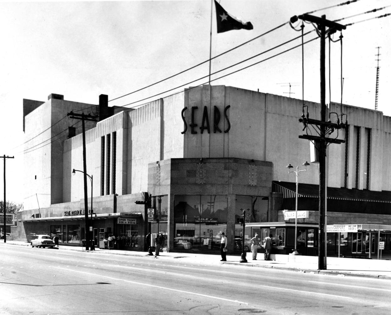 This March 1, 1959, file photo shows a Sears building in downtown Houston. Sears has filed for Chapter 11 bankruptcy protection Monday, Oct. 15, 2018. (Houston Chronicle via AP, File)