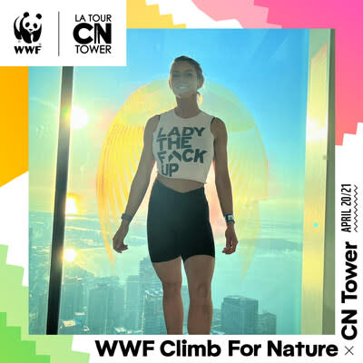 Lexie Ward, the WWF Climb for Nature 2023 fastest female climber, at the top of the CN Tower.  Photo Courtesy of Lexie Ward. (CNW Group/World Wildlife Fund Canada)