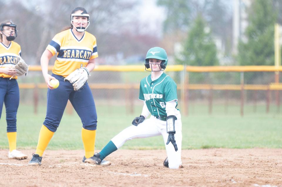 Pennfield senior Avery Moran reaches third base during a game at Battle Creek Central High School on Thursday, April 4, 2024.