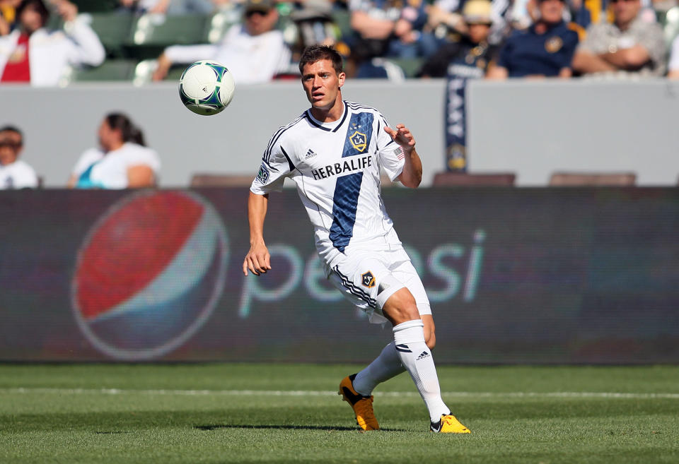 CARSON, CA - MARCH 03:  Colin Clark #11 of the Los Angeles Galaxy looks to control the ball on the attack against the Chicago Fire during the MLS match at The Home Depot Center on March 3, 2013 in Carson, California. The Galaxy defeated the Fire 4-0.  (Photo by Victor Decolongon/Getty Images) 