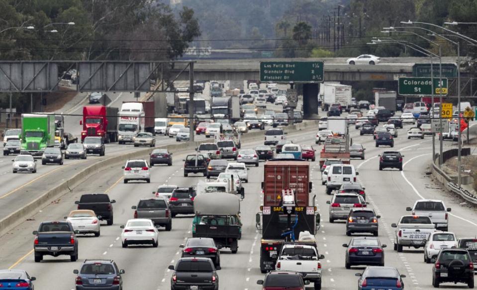 In this Thursday, Feb. 6, 2014 photo, late morning traffic travels on Interstate 5, in Los Angeles. In California, I-5 in Los Angeles County is the most congested route, according to new data from the California Department of Transportation. (AP Photo/Damian Dovarganes)