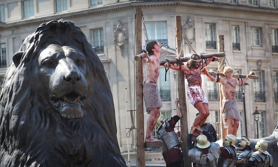 Actors perform The Passion of Jesus to crowds in Trafalgar Square in 2011 in London, England. The actors come from the Wintershall Estate in Surrey where they also perform a Nativity play in and around the farm buildings at Christmas.