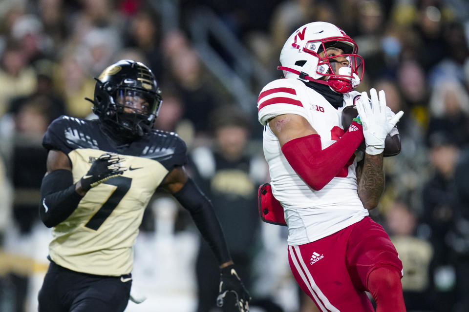 Nebraska wide receiver Trey Palmer (3) makes a catch in front of Purdue cornerback Jamari Brown (7) during the first half of an NCAA college football game in West Lafayette, Ind., Saturday, Oct. 15, 2022. (AP Photo/Michael Conroy)