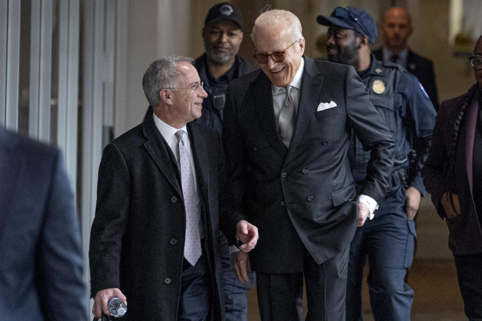 James Biden, brother of President Joe Biden, accompanied by Attorney Paul Fishman, left, arrives for a private interview with House Republicans at Thomas P. O'Neill House Office Building on Capitol Hill in Washington, Wednesday, Feb. 21, 2024. (AP Photo/Andrew Harnik)