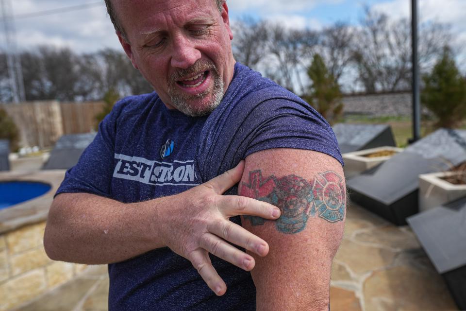 Michael Irving, former West Police officer and first on scene at the 2013 fire at West Fertilizer Plant, shows a tattoo dedicated to first responders which includes the badge number of one of his closest friends, Joey Pustejovsky.