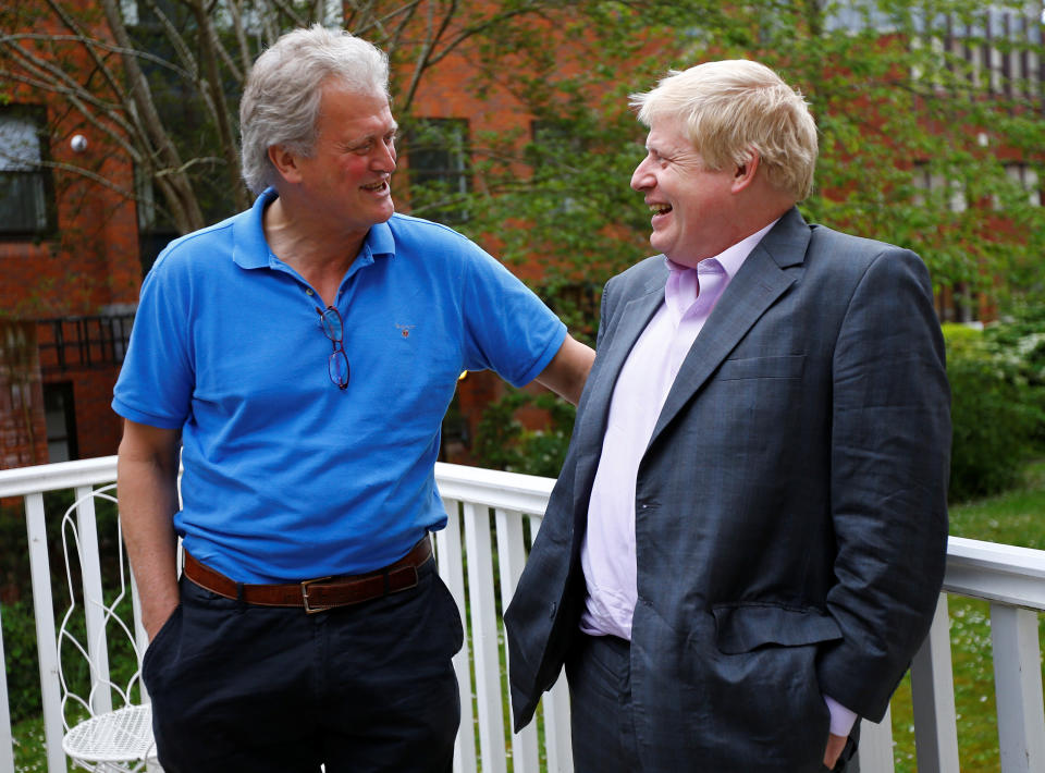 Former London Mayor Boris Johnson (R) speaks with J D Wetherspoon Chairman Tim Martin during a Vote Leave reception in Exeter, Britain May 11, 2016.  REUTERS/Darren Staples