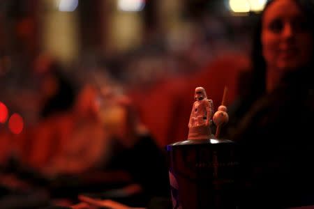 A moviegoer's beverage is pictured before the first showing of the movie "Star Wars: The Force Awakens" at the TCL Chinese Theatre in Hollywood, California, December 17, 2015. REUTERS/Mario Anzuoni