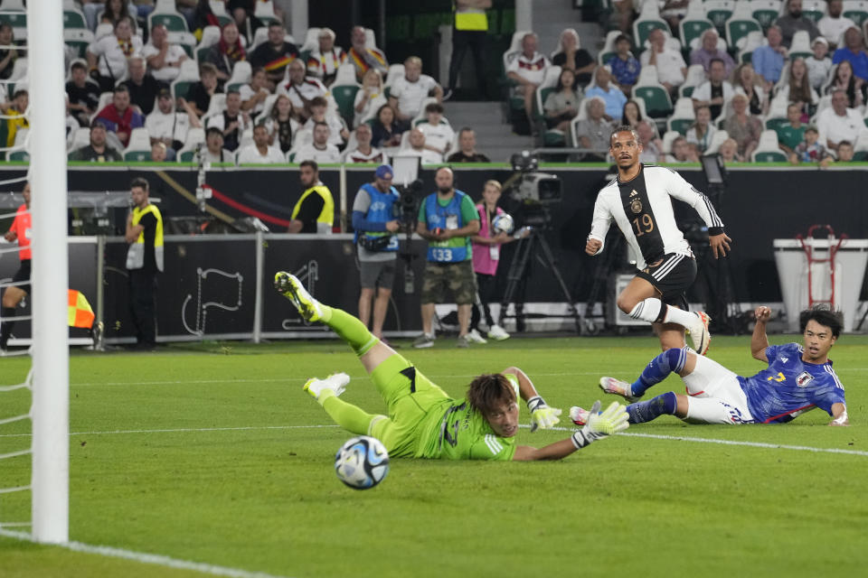 Germany's Leroy Sane (19) scores his side's opening goal during an international friendly soccer match between Germany and Japan in Wolfsburg, Germany, Saturday, Sept. 9, 2023. (AP Photo/Martin Meissner)