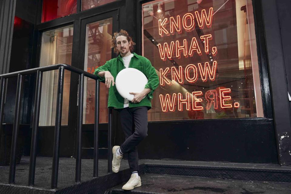 RADAR founder Spencer Hewett stands outside company headquarters holding one of the RFID sensor devices that makes his<br> inventory-tracking company’s technology possible. <strong>Photo Courtesy of RADAR</strong>