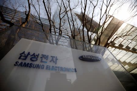 The logo of Samsung Electronics is seen in front of its building in Seoul, South Korea, February 28, 2017. Picture taken February 28, 2017. REUTERS/Kim Hong-Ji