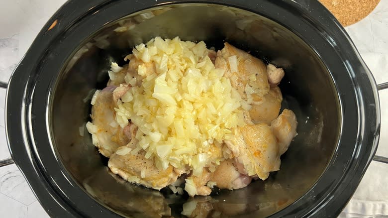 chicken and onions in pot