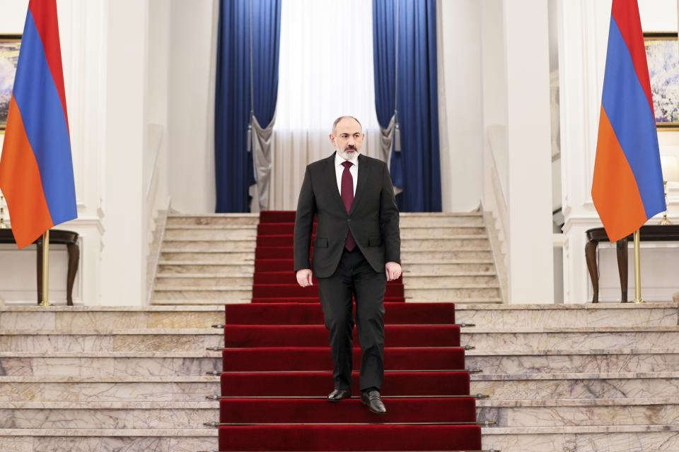 Armenian Prime Minister Nikol Pashinyan arrives to attend a news conference in Yerevan, Armenia, Tuesday, Jan. 10, 2023. Armenia's prime minister says his country has refused to host military drills planned by a Russia-dominated security pact. Pashinyan's announcement on Tuesday reflected Armenia's growing tensions with Moscow. (Tigran Mehrabyan, PAN Photo via AP)