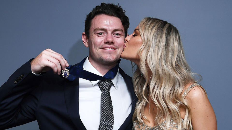 Lachie Neale is seen here alongside his wife Julie.