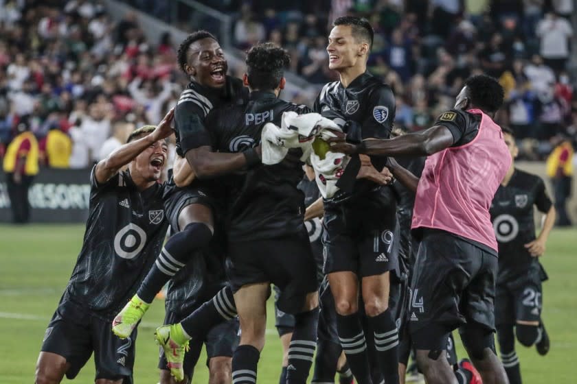 Los Angeles, CA, Wednesday, August 25, 2021 - MLS teammates swarm Ricardo Pepe after he scored the clinching penalty kick to beat Liga MX in the MLS All-Star game at Banc of California Park. (Robert Gauthier/Los Angeles Times)