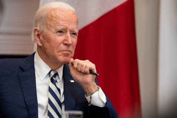President Joe Biden, wearing his late son Beau's rosary on his left wrist, listens during a virtual meeting with Mexican President Andrés Manuel López Obrador in the Roosevelt Room of the White House on March 1, 2021 in Washington, DC.