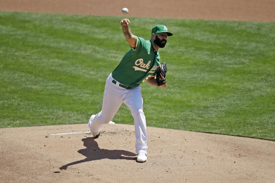 Oakland Athletics pitcher Mike Fiers works against the Texas Rangers in the first inning of a baseball game Thursday, Aug. 6, 2020, in Oakland, Calif. (AP Photo/Ben Margot)