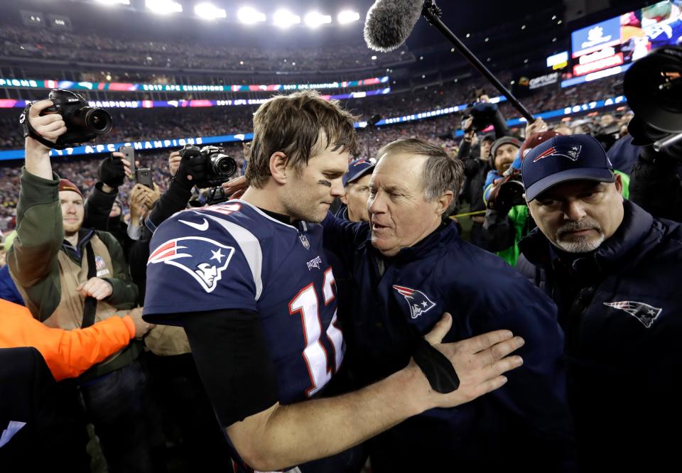 In this Jan. 21, 2018, file photo, New England Patriots quarterback Tom Brady, left, hugs coach Bill Belichick after the AFC championship NFL football game against the Jacksonville Jaguars, in Foxborough, Mass. Brady is an NFL free agent for the first time in his career.