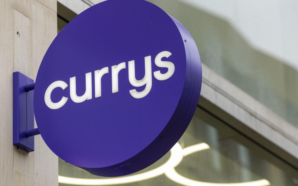 Currys profits rose over the last year, when it fended off takeover bids from Elliott