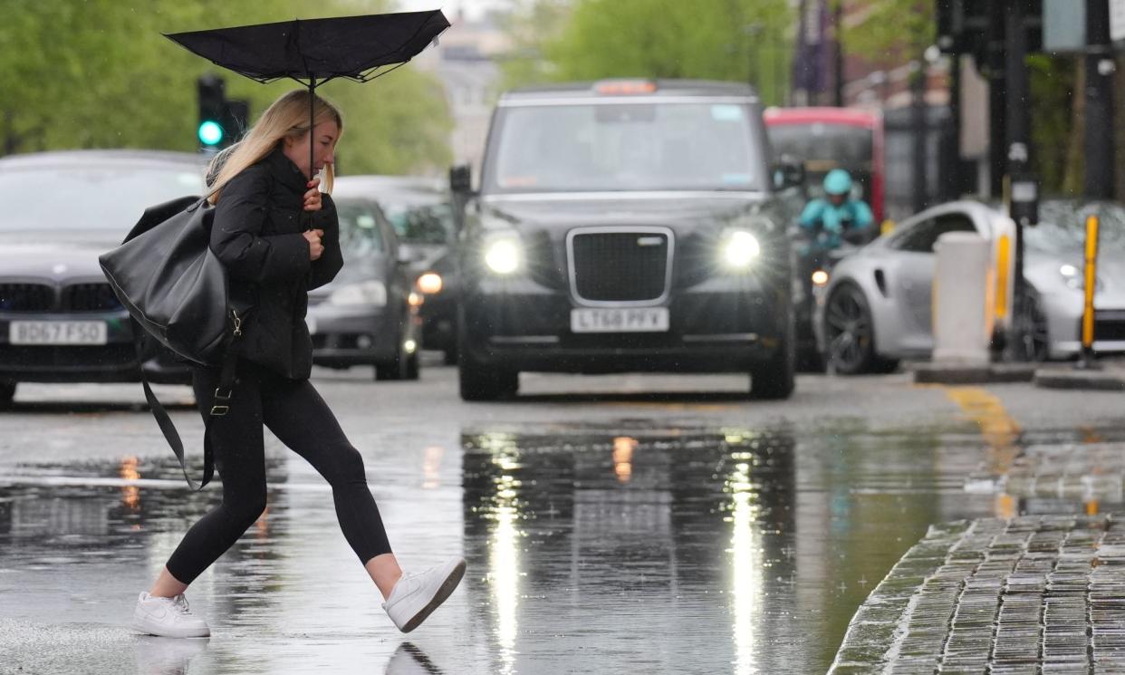 <span>The lack of sunshine, grey skies and persistent rain have contributed to it feeling unusually cold as April comes to a close.</span><span>Photograph: Jonathan Brady/PA</span>