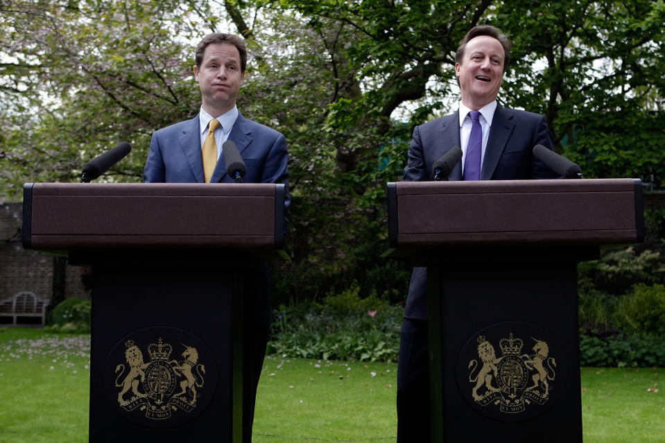 LONDON, ENGLAND - MAY 12:  Prime Minister David Cameron (R) and Deputy Prime Minister Nick Clegg share a joke as they hold their first joint press conference in the Downing Street garden on May 12, 2010 in London, England. On his first full day as Prime Minister, David Cameron has made a series of cabinet appointments including Nick Clegg as Deputy Prime Minister. The Conservatives and Liberal Democrats have now agreed to lead the country with a fully inclusive coalition government.  (Photo by Christopher Furlong - WPA Pool /Getty Images)