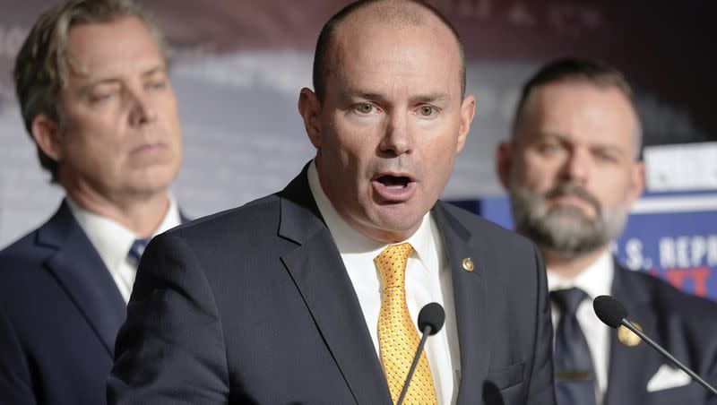 Sen. Mike Lee, R-Utah, center, speaks during a news conference on border security and funding on Capitol Hill on Wednesday, Jan. 10, 2024, as Rep. Cory Mills, R-Fla., right, and Rep. Andrew Ogles, R-Tenn., left, listen in Washington.