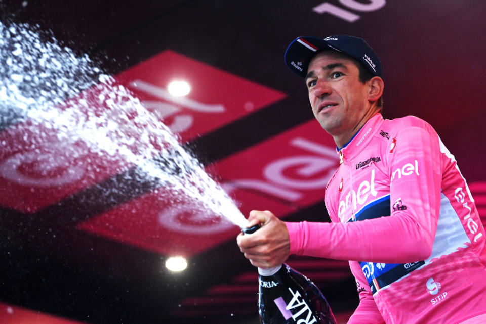 CASSANO MAGNAGO ITALY  MAY 20 Bruno Armirail of France and Team Groupama  FDJ celebrates at podium as Pink Leader Jersey winner during the 106th Giro dItalia 2023 Stage 14 a 194km stage from Sierre to Cassano Magnago  UCIWT  on May 20 2023 in Cassano Magnago Italy Photo by Tim de WaeleGetty Images