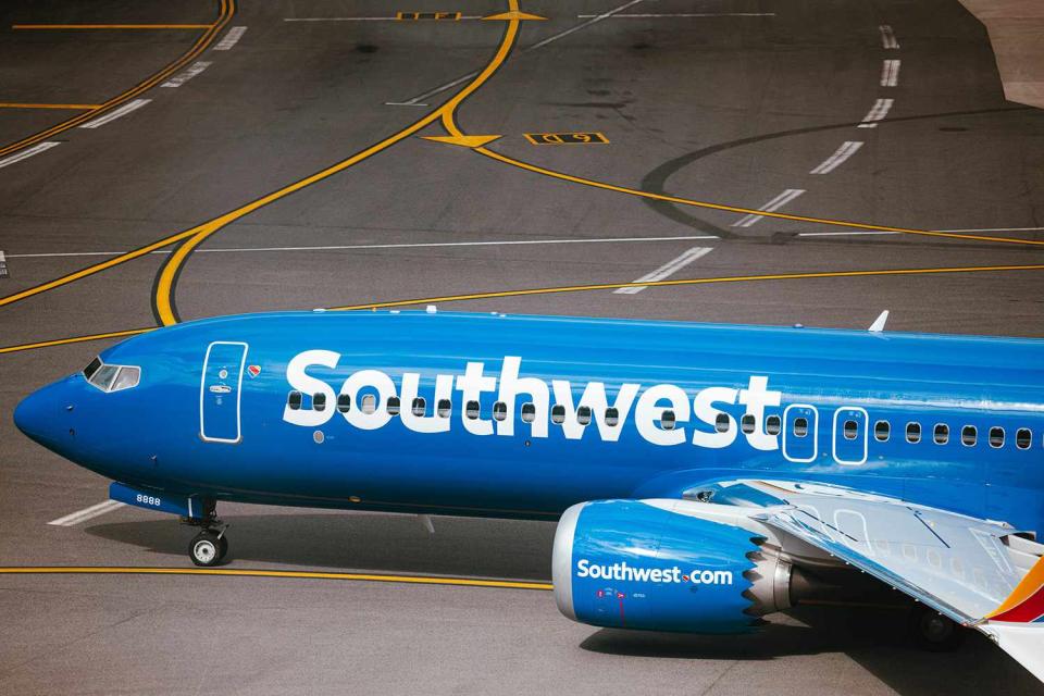 <p>Angus Mordant/Bloomberg via Getty</p> A Southwest Airlines jet