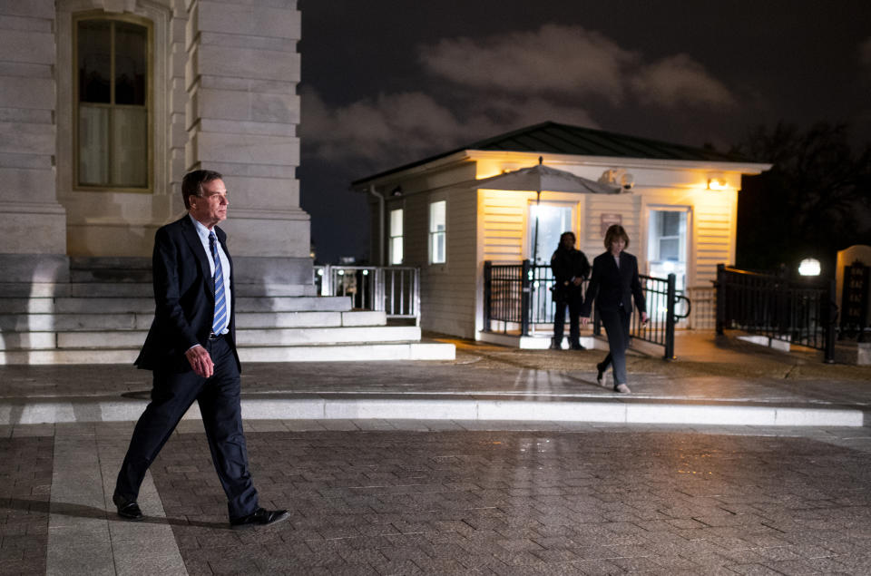 UNITED STATES - MARCH 25: Sen. Mark Warner, D-Va., and Sen. Tina Smith, D-Minn., leave the Capitol after voting on the Coronavirus Aid, Relief, and Economic Security Act in the Capitol on Wednesday night, March 25, 2020. (Photo By Bill Clark/CQ-Roll Call, Inc via Getty Images)