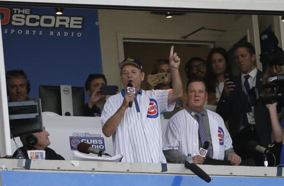 Bill Murray sings “Take Me Out to the Ball Game” during the seventh inning stretch in Game 3 of the NLDS between the Cubs and Nationals Monday, Oct. 9, 2017, in Chicago. (AP Photo)