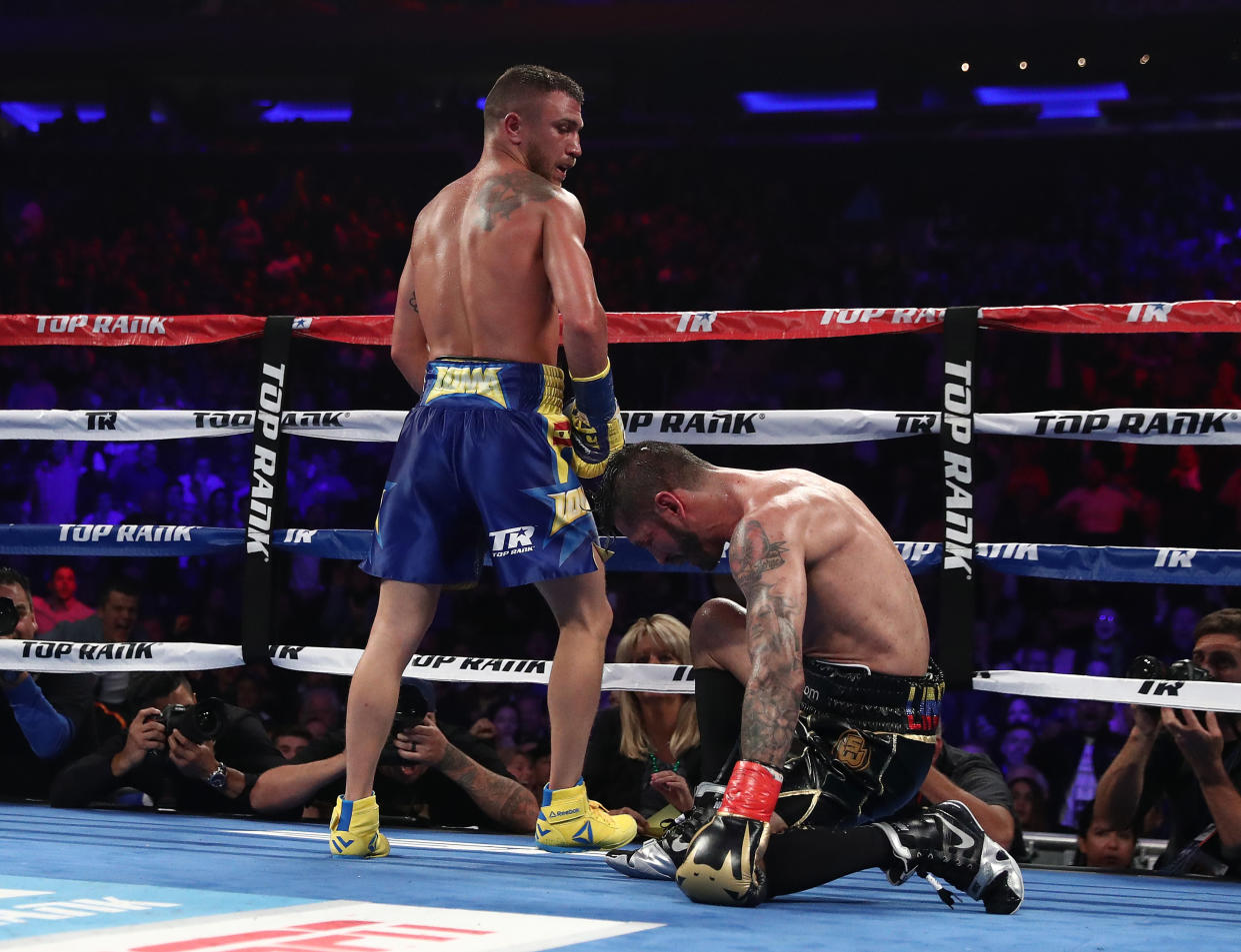 Vasiliy Lomachenko knocks down Jorge Linares in the tenth round during their WBA lightweight title fight at Madison Square Garden on May 12, 2018 in New York City. (Getty Images)