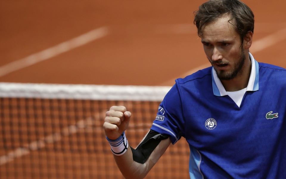 Medvedev celebrates a point against Kecmanovic - Christophe Petit Tesson/Shutterstock