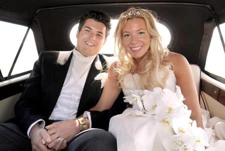 Acid attack victim Andreas Christopheros smiles on his wedding day next to his wife in a photograph he provided which was taken before he was badly injured on the doorstep of his home with a corrosive liquid, in Truro, Britain. Andreas Christopheros handout via REUTERS