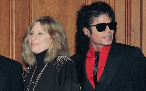 Barbra Streisand and Michael Jackson attend a ceremony together in 1986 - Credit: Mark Avery/AP