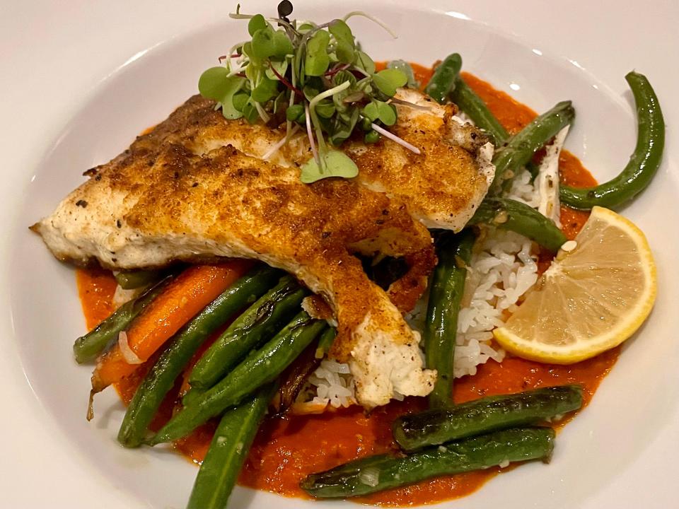 Cumin-dusted flounder and vegetables from Millie's Restaurant and Catering in Daytona Beach Shores.