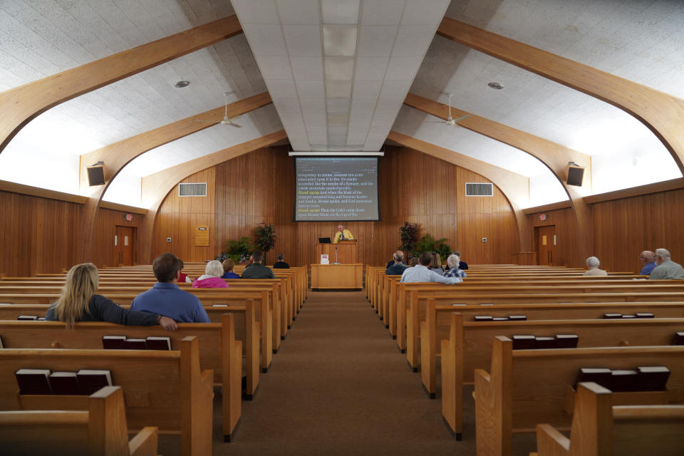 David Padfield, minister of Church of Christ, leads an evening bible study on Wednesday, Sept. 14, 2022, in Zion, Ill. (AP Photo/Jessie Wardarski)