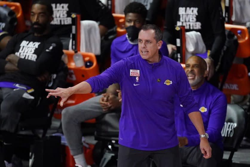 Los Angeles Lakers head coach Frank Vogel directs his team during the second half of an NBA.