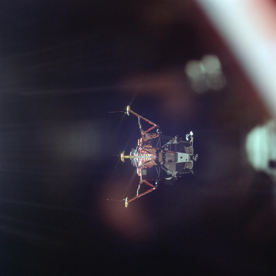 In this July 20, 1969 photo made available by NASA, the Apollo 11 Lunar Module undocks from the Command Module on its way to the surface of the moon. (Michael Collins/NASA via AP)