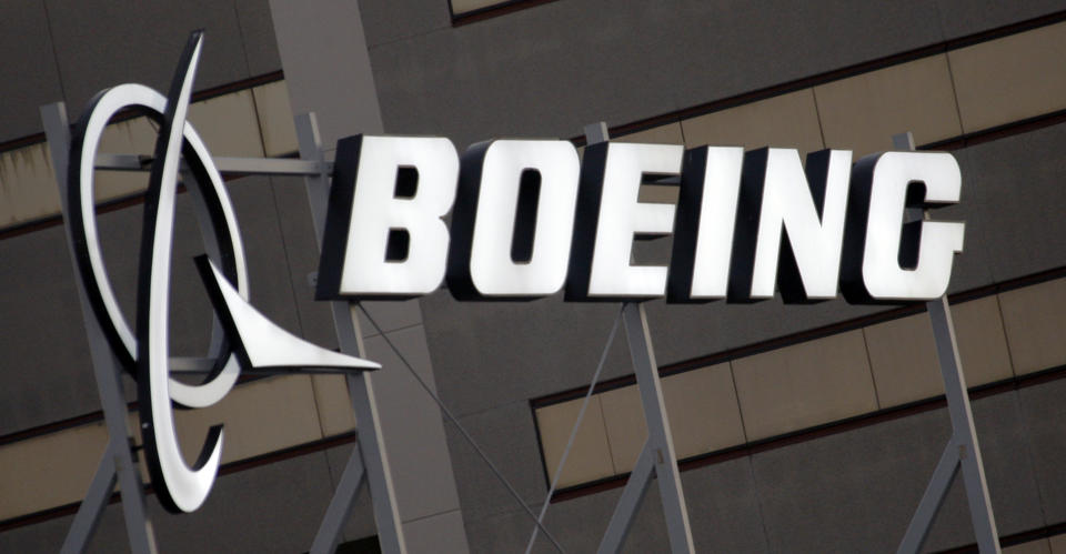 FILE - In this Jan. 25, 2011, file photo, is the Boeing Company logo on the property in El Segundo, Calif. China's government said Monday, Oct. 26, 2020, it will impose sanctions on U.S. military contractors including Boeing Co.'s defense unit and Lockheed Martin Corp. for supplying weapons to rival Taiwan, stepping up a feud with Washington over security and Beijing's strategic ambitions. (AP Photo/Reed Saxon, File)