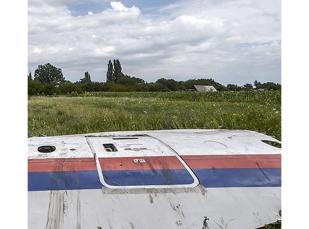 A piece of the MH17 wreckage found in a field near the village of Grabove in eastern Ukraine. Photo: AFP.