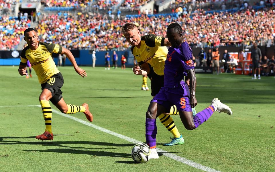 Naby Keita competes for the ball during Liverpool's loss - Liverpool FC