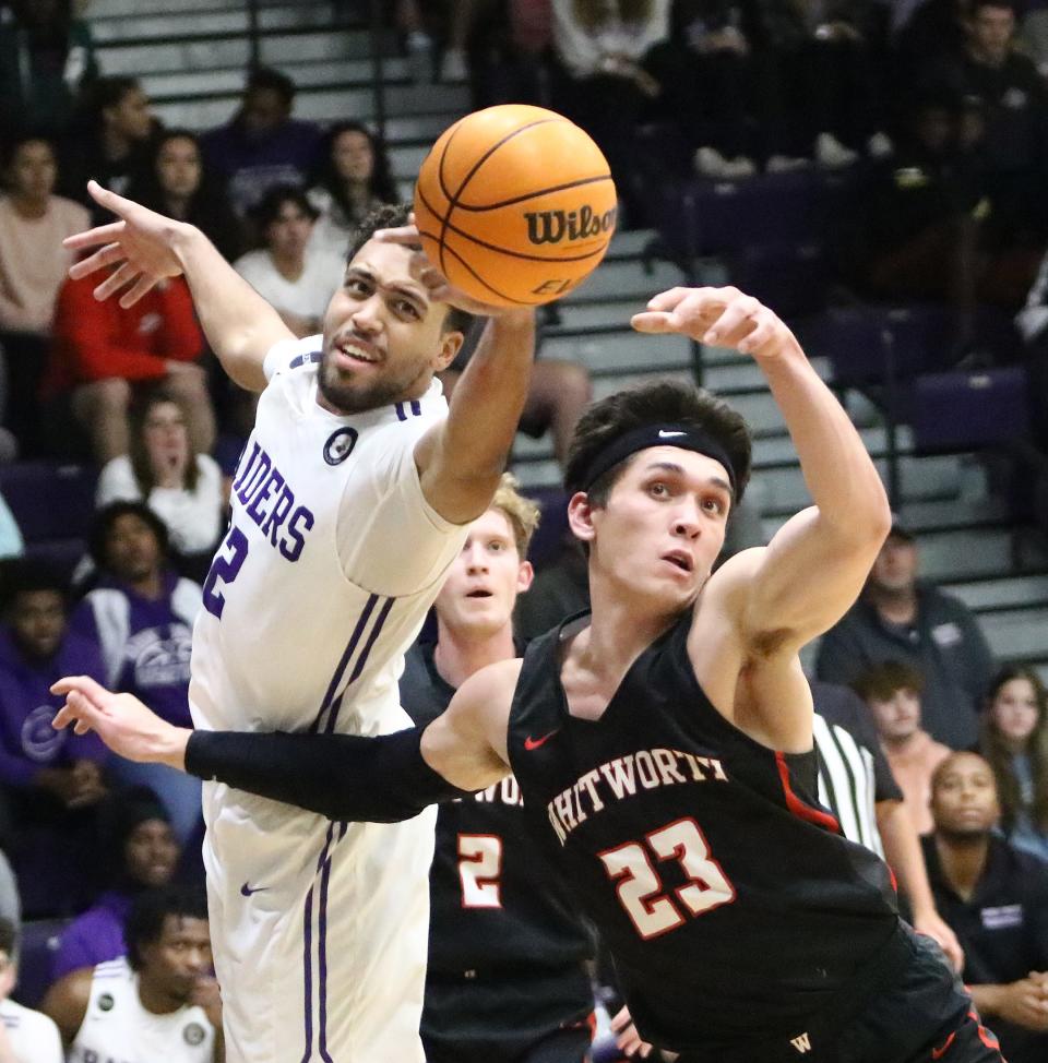 Christian Parker, left, had 24 points for Mount Union in its loss at Heidelberg on Saturday.