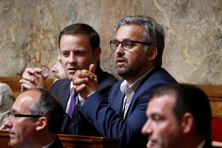 Newly-elected member of parliament Alexis Corbiere (R) of La France Insoumise political party (France Unbowed) attend the opening session of the French National Assembly in Paris, France, June 27, 2017. REUTERS/Charles Platiau