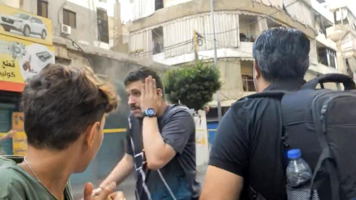 PHOTO: People attending a funeral for victims of Tuesday's pager attacks in Lebanon react after an explosion in a store, in southern Beirut, Sept. 18, 2024. (ABC News)