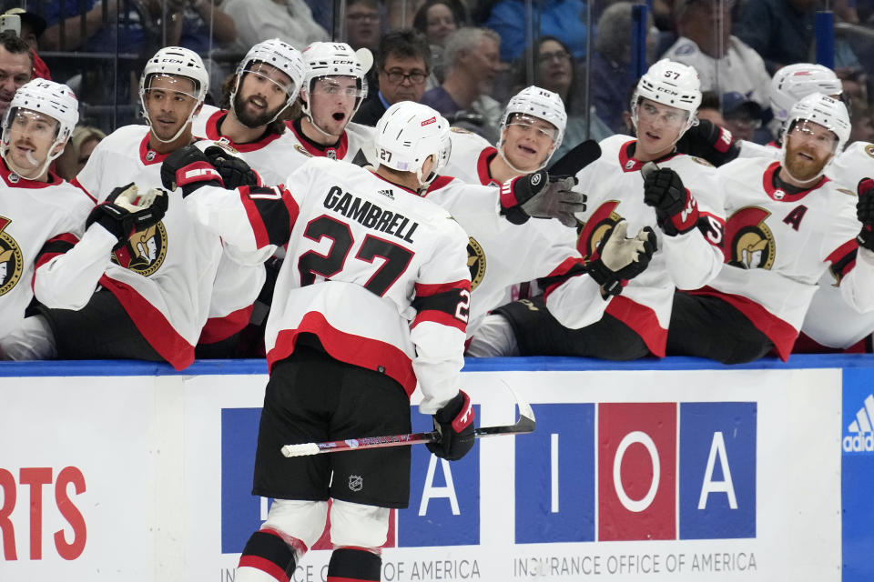 Ottawa Senators center Dylan Gambrell (27) celebrates with the bench after his goal against the Tampa Bay Lightning during the first period of an NHL hockey game Tuesday, Nov. 1, 2022, in Tampa, Fla. (AP Photo/Chris O'Meara)