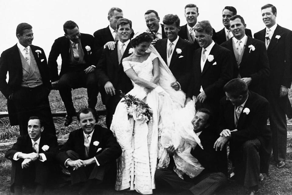 <p>JFK's best man was his brother Robert and his ushers included his brother Teddy, brother-in-law Sargent Shriver, cousin Joe Gargan, brother-in-law Michael Canfield, Lem Billings, Red Fay, and Torbert Macdonald, George Smathers, and Charles BartleThe ceremony was performed by Archbishop Cushing, a friend of the Kennedy family, and he was assisted by four other priests, including the former president of Notre Dame and the head of the Christopher Society. Before the mass, a special blessing from Pope Pius XII was read. </p>